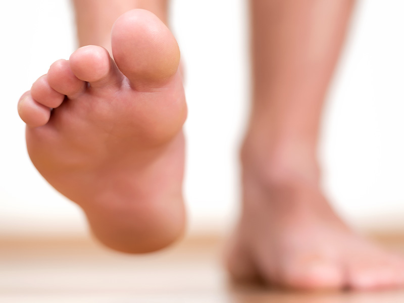 simple illustration of a foot in a circular design 13 foot care tips for healthy feet