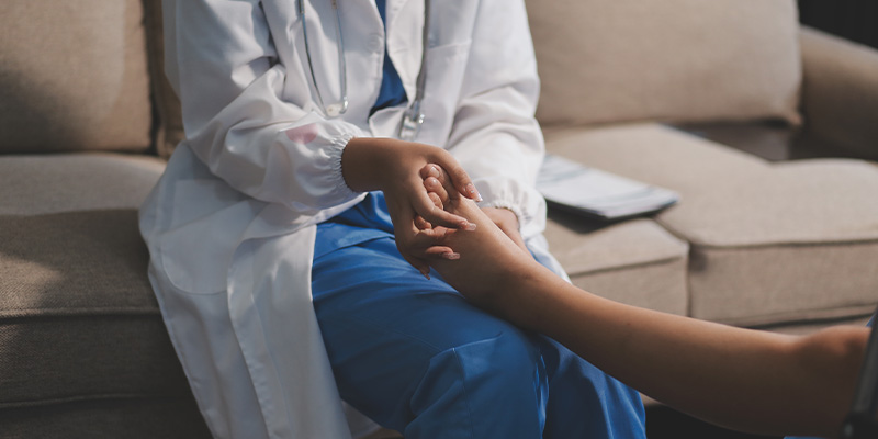 medical professional holding hands in comforting gesture healthcare support 3 care compassion